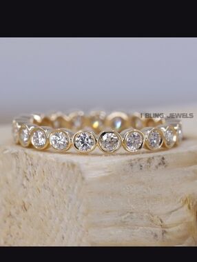 10k Yellow Gold and Moissanite Bezel Infinity Band